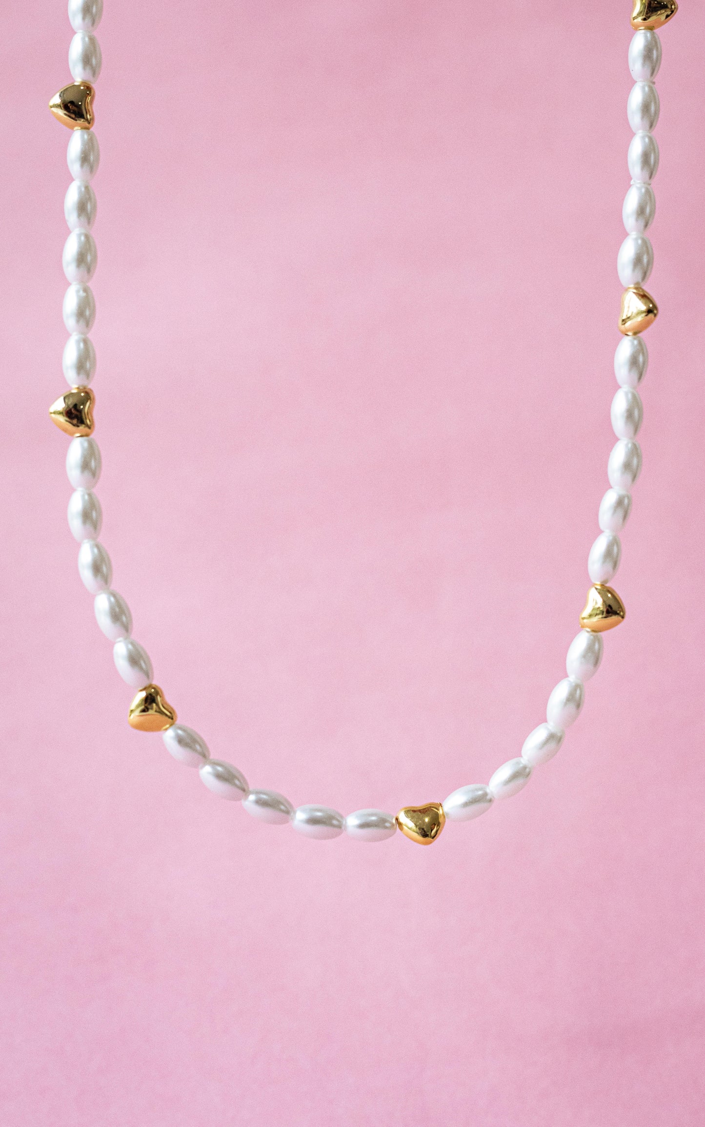 Collar perlas y corazón