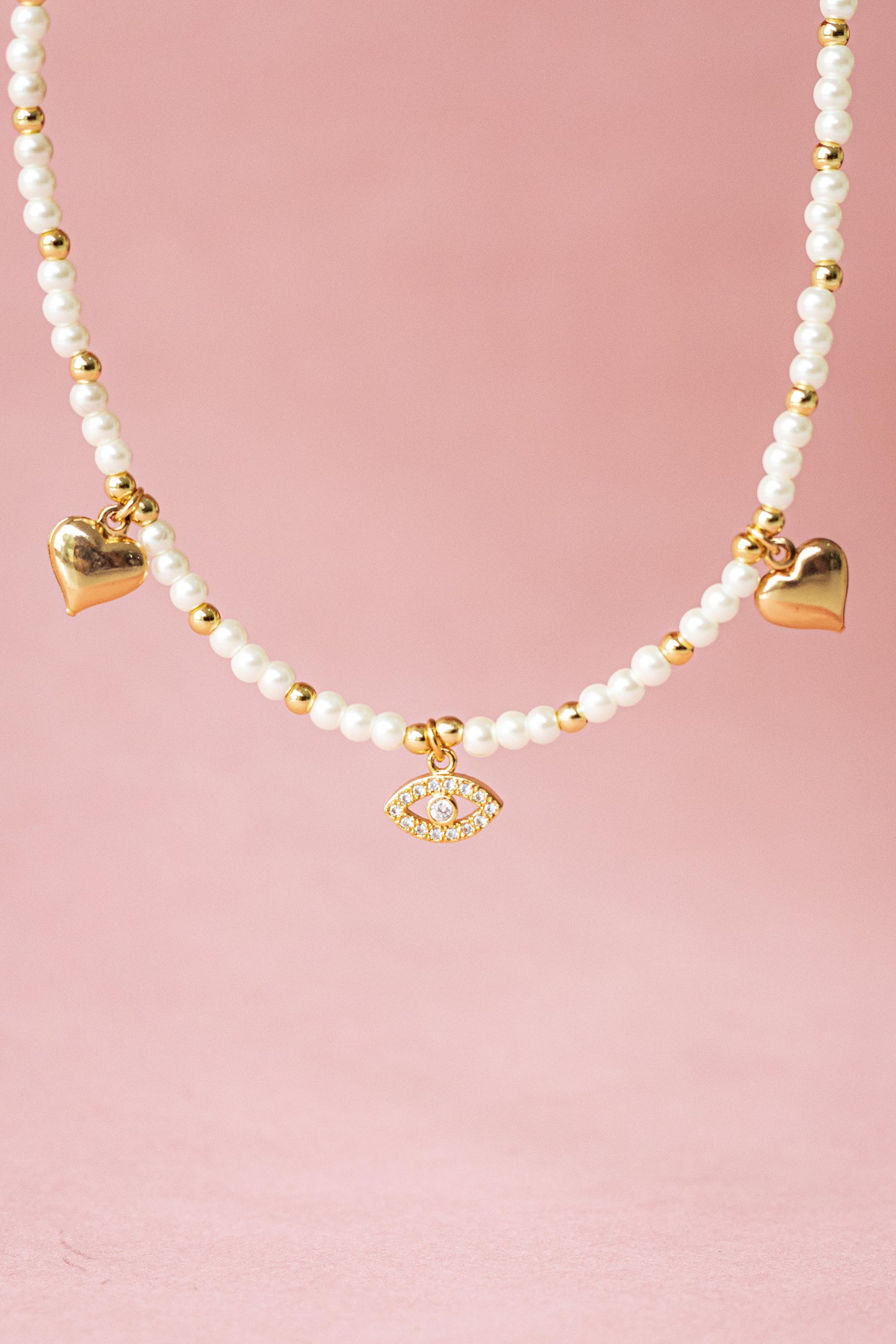 Collar perlas y dijes